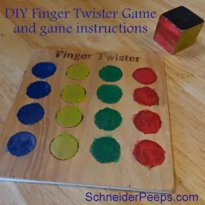 Wooden finger twister game on table
