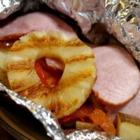 ham and pineapple in foil packet on grill